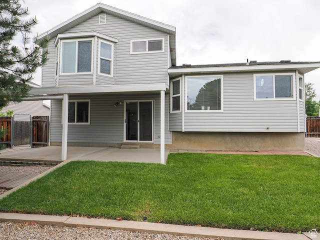 rear view of property with a patio area