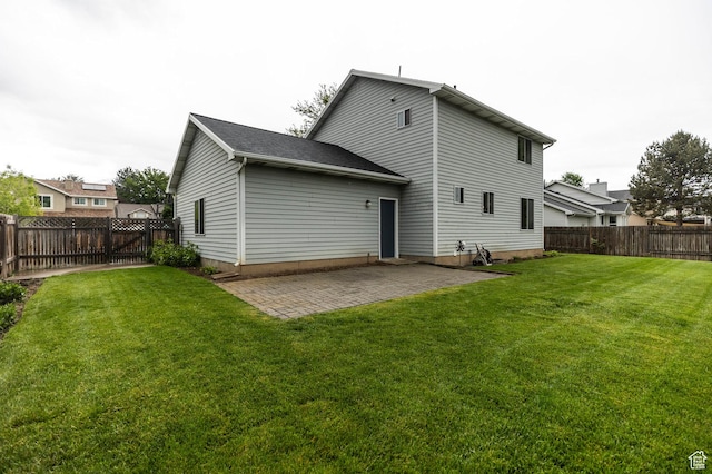 back of house with a patio area