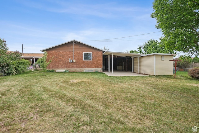 2268 W 5300 S, Roy, UT 84067 - back of property with a patio area and brick siding