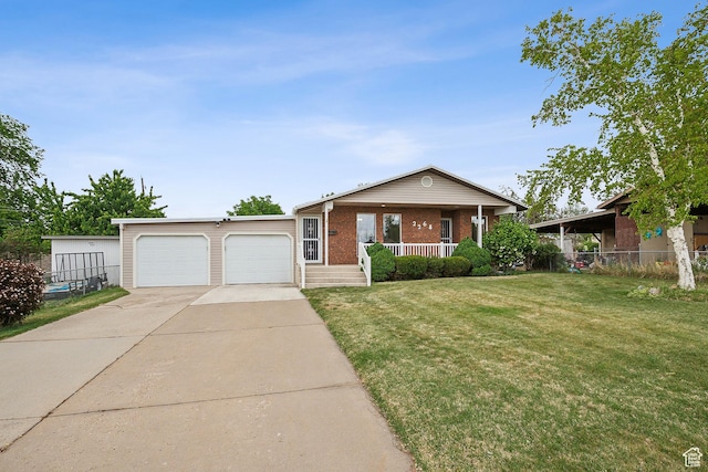 2268 W 5300 S, Roy, UT 84067 - single story home featuring a porch, brick siding, driveway, and an attached garage