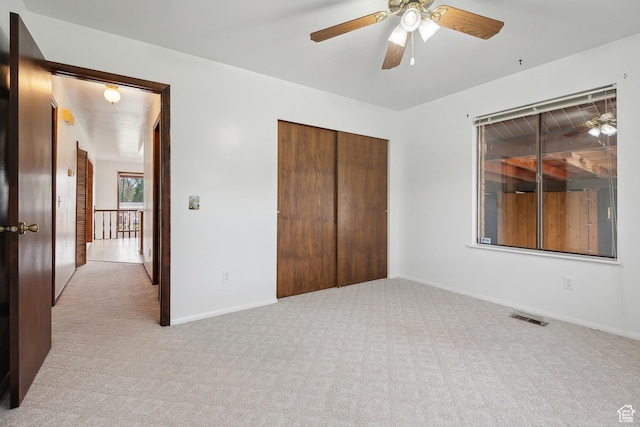 2268 W 5300 S, Roy, UT 84067 - unfurnished bedroom with carpet, a closet, baseboards, and ceiling fan