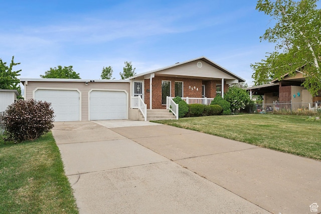 2268 W 5300 S, Roy, UT 84067 - ranch-style home featuring a garage, concrete driveway, covered porch, a front lawn, and brick siding