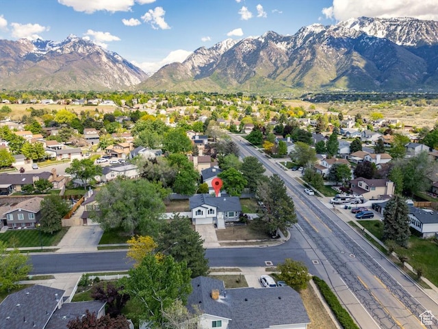 aerial perspective of suburban area featuring a mountainous background