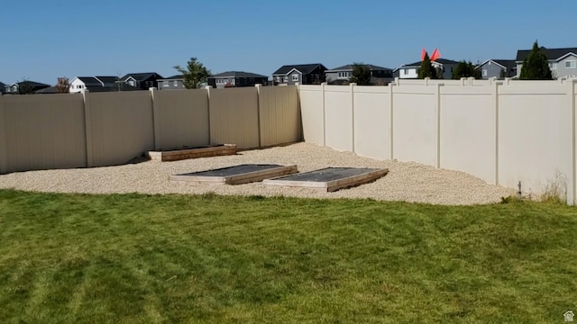 view of yard featuring a residential view