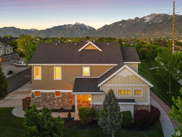 82 E Danta Dr S, Draper, UT 84020 - view of front of property featuring stone siding, a mountain view, board and batten siding, and roof with shingles