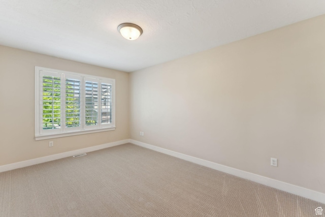 82 E Danta Dr S, Draper, UT 84020 - spare room featuring baseboards and light colored carpet