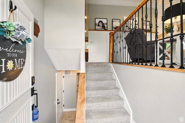 stairway with baseboards