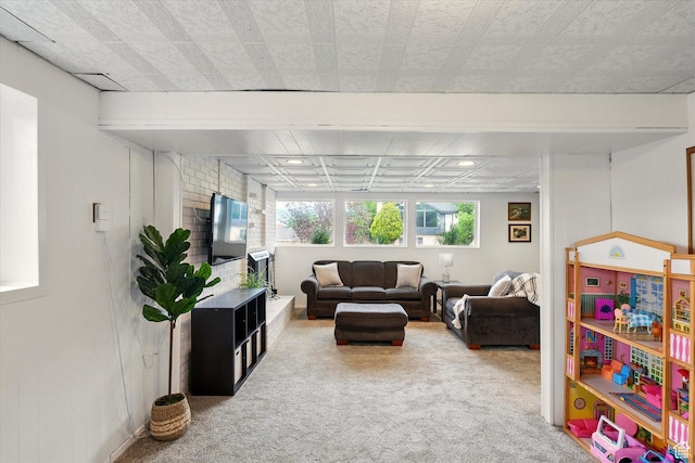 carpeted living room with recessed lighting
