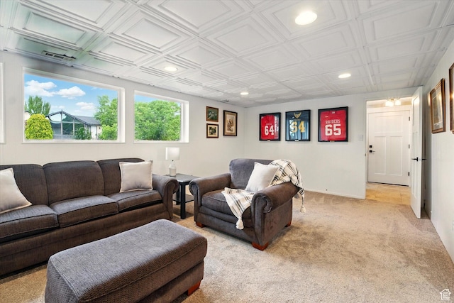 living room featuring recessed lighting, light carpet, an ornate ceiling, and baseboards