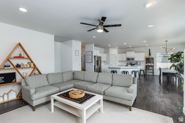 57 S Sterling Way, Vineyard, UT 84059 - living room featuring ceiling fan, recessed lighting, wood-type flooring, and a chandelier