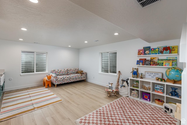 57 S Sterling Way, Vineyard, UT 84059 - game room with recessed lighting, baseboards, wood finished floors, and a textured ceiling