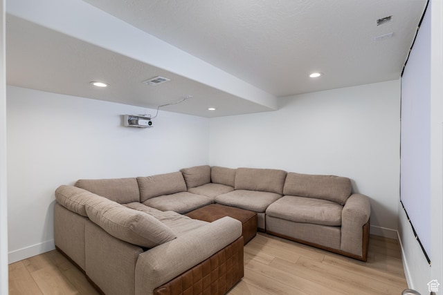 57 S Sterling Way, Vineyard, UT 84059 - living room featuring light wood-style flooring, baseboards, and recessed lighting