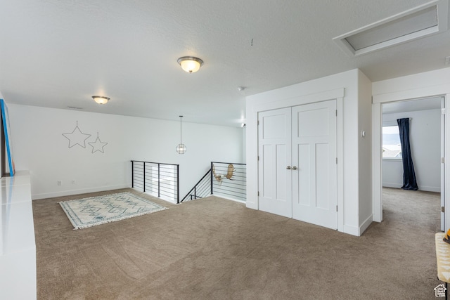 57 S Sterling Way, Vineyard, UT 84059 - carpeted spare room featuring attic access and baseboards