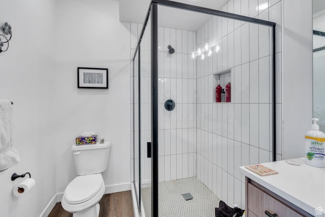 1218 S Sawmill Blvd Unit 1-106, Heber City, UT 84032 - bathroom with a stall shower, toilet, wood finished floors, and baseboards