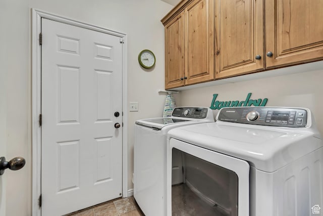 5414 W Island Creek Dr S, West Jordan, UT 84081 - clothes washing area with washing machine and dryer and cabinet space