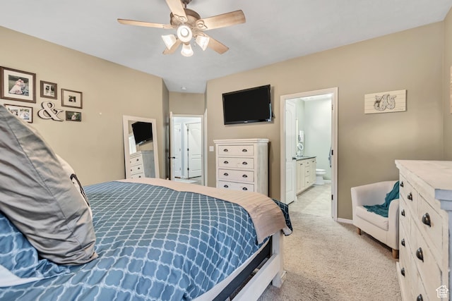 5414 W Island Creek Dr S, West Jordan, UT 84081 - bedroom with light carpet, ceiling fan, connected bathroom, and baseboards