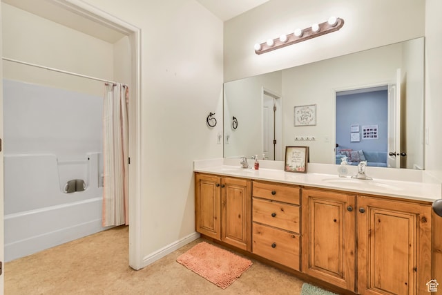 5414 W Island Creek Dr S, West Jordan, UT 84081 - full bath with double vanity, ensuite bathroom, shower / tub combo, and baseboards
