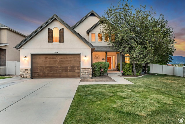 5414 W Island Creek Dr S, West Jordan, UT 84081 - view of front of property with concrete driveway, stone siding, and stucco siding