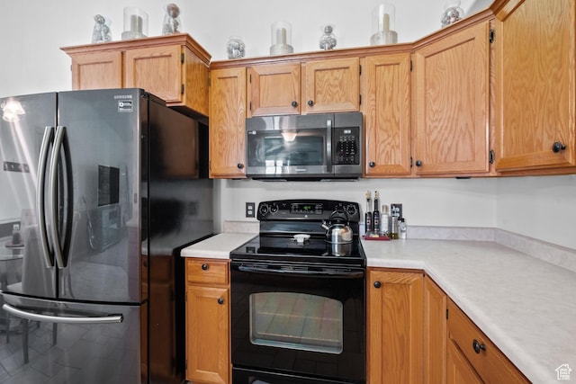 1512 N 1335 W, Orem, UT 84057 - kitchen featuring stainless steel appliances, light countertops, and brown cabinetry