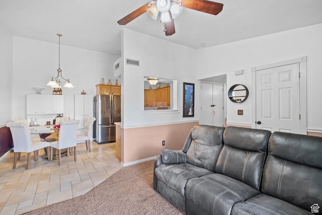1512 N 1335 W, Orem, UT 84057 - living room featuring ceiling fan, high vaulted ceiling, stone tile floors, and baseboards