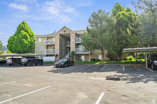 1512 N 1335 W, Orem, UT 84057 - view of building exterior with covered and uncovered parking