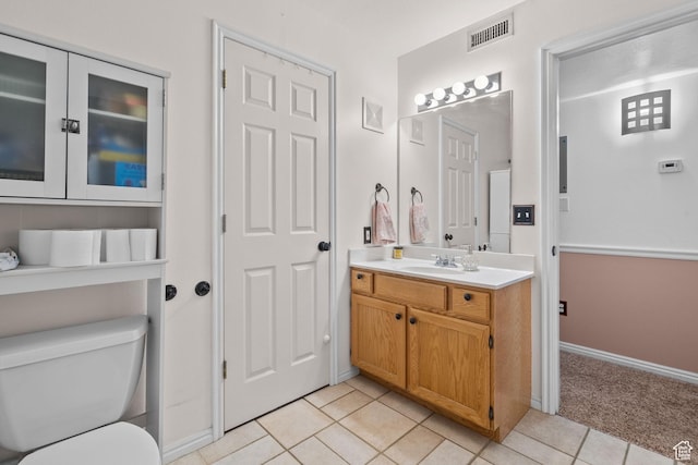 1512 N 1335 W, Orem, UT 84057 - bathroom with vanity, tile patterned flooring, toilet, and baseboards