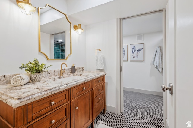 full bathroom with vanity and tile patterned floors