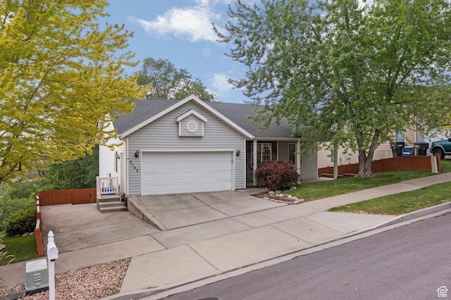 2142 Alaska Ave, Provo, UT 84606 - ranch-style home featuring concrete driveway, a garage, roof with shingles, and a front lawn
