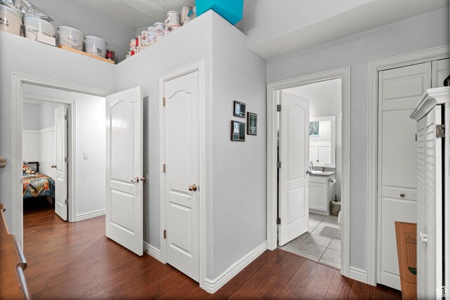 2142 Alaska Ave, Provo, UT 84606 - hall featuring dark wood finished floors and baseboards
