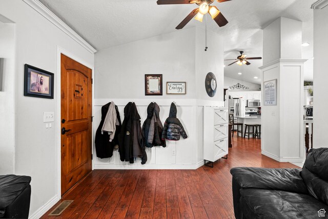 2142 Alaska Ave, Provo, UT 84606 - entrance foyer with lofted ceiling, ceiling fan, dark wood-style floors, a wainscoted wall, and a textured ceiling