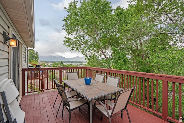 2142 Alaska Ave, Provo, UT 84606 - wooden deck featuring outdoor dining space and a mountain view