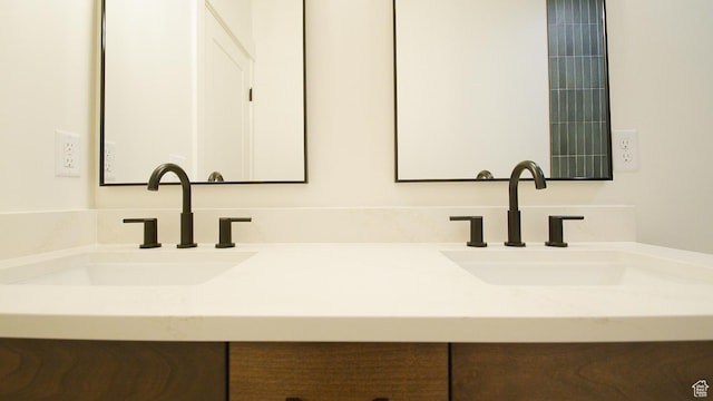 bathroom featuring double vanity