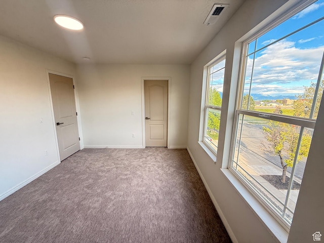 7038 W 8090 S, West Jordan, UT 84081 - carpeted empty room featuring baseboards