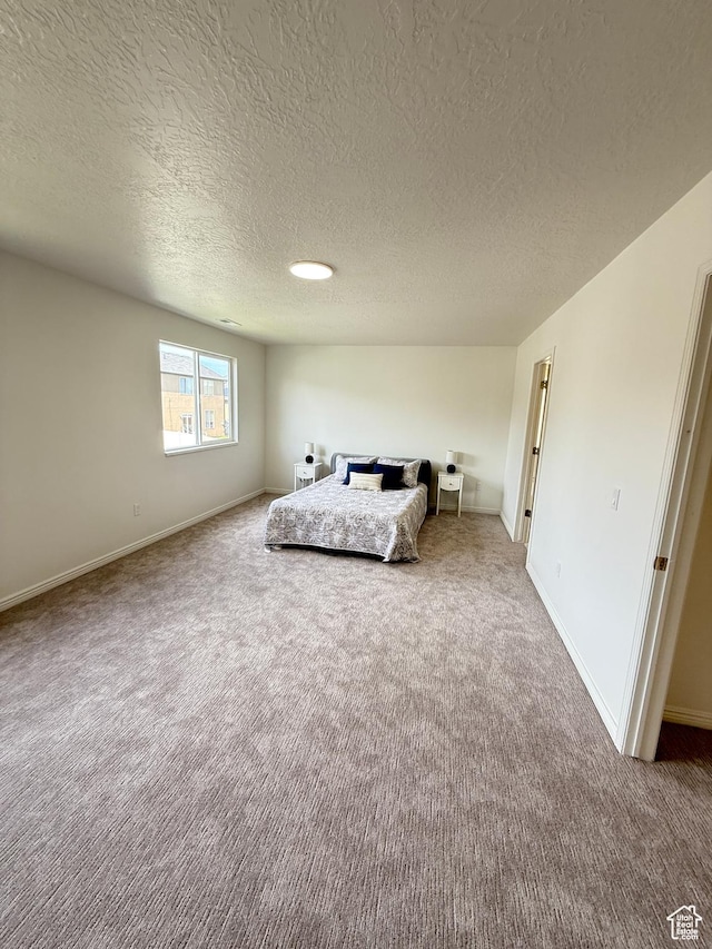 7038 W 8090 S, West Jordan, UT 84081 - carpeted bedroom featuring a textured ceiling and baseboards