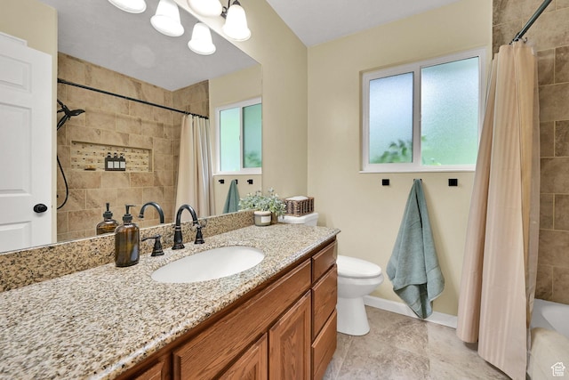 1780 N 800 E, North Ogden, UT 84414 - bathroom with healthy amount of natural light, baseboards, vanity, and toilet