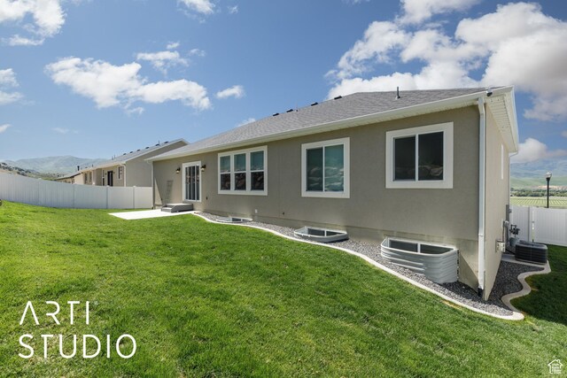 752 N Sunset Dr, Morgan, UT 84050 - back of house featuring a patio and central AC