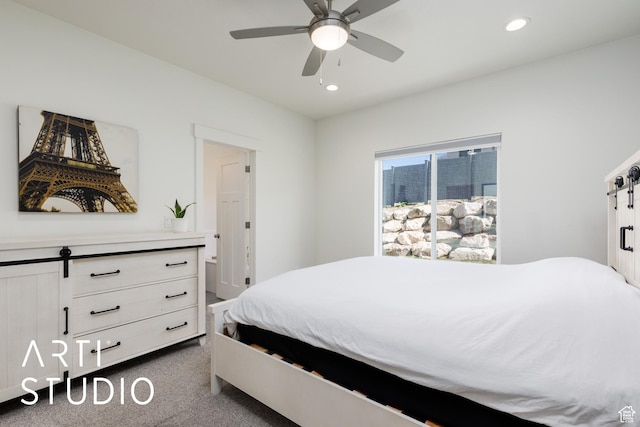 752 N Sunset Dr, Morgan, UT 84050 - bedroom with a barn door, recessed lighting, dark carpet, and ceiling fan