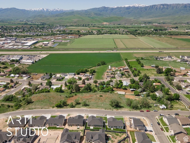 752 N Sunset Dr, Morgan, UT 84050 - aerial view of property and surrounding area featuring mountains, rows of crops, and rural landscape