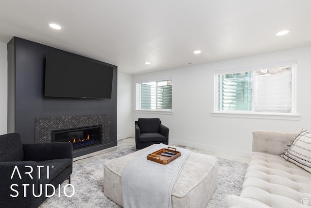 752 N Sunset Dr, Morgan, UT 84050 - living area with recessed lighting, a glass covered fireplace, and baseboards
