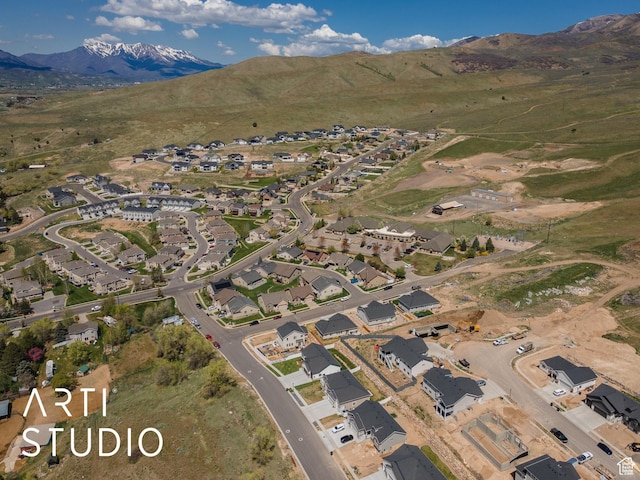 752 N Sunset Dr, Morgan, UT 84050 - aerial view of property and surrounding area featuring mountains and nearby suburban area