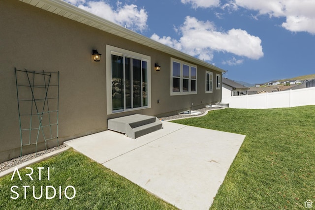 752 N Sunset Dr, Morgan, UT 84050 - back of property with a patio and stucco siding
