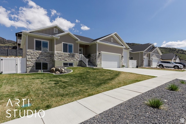 752 N Sunset Dr, Morgan, UT 84050 - view of front of house featuring a gate, board and batten siding, concrete driveway, and stone siding