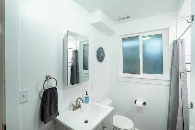 1088 N Nayon Dr Unit B, Layton, UT 84040 - full bathroom with toilet, vanity, and a shower with shower curtain