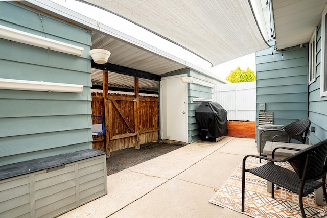 1088 N Nayon Dr Unit B, Layton, UT 84040 - view of patio featuring area for grilling and fence