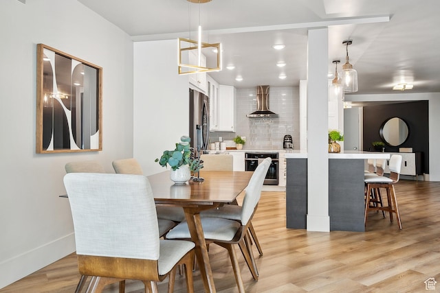900 S Donner Way E Unit 707, Salt Lake City, UT 84108 - dining room featuring light wood finished floors and recessed lighting
