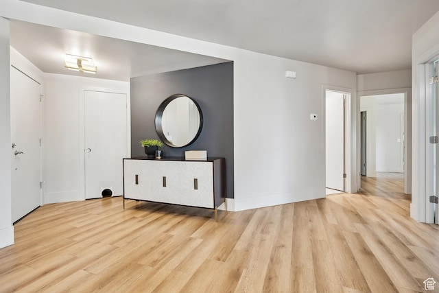 900 S Donner Way E Unit 707, Salt Lake City, UT 84108 - foyer with wood finished floors and baseboards