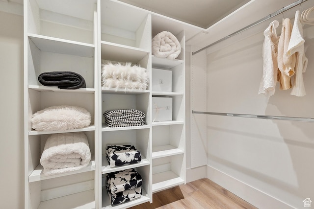 900 S Donner Way E Unit 707, Salt Lake City, UT 84108 - spacious closet featuring wood finished floors