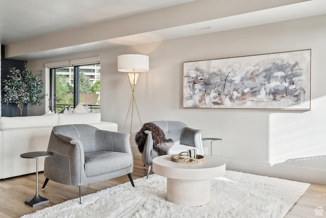 900 S Donner Way E Unit 707, Salt Lake City, UT 84108 - living area featuring wood finished floors
