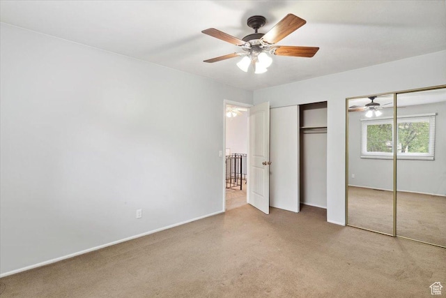 22 W 1470 S, Farmington, UT 84025 - unfurnished bedroom featuring two closets, carpet flooring, baseboards, and a ceiling fan