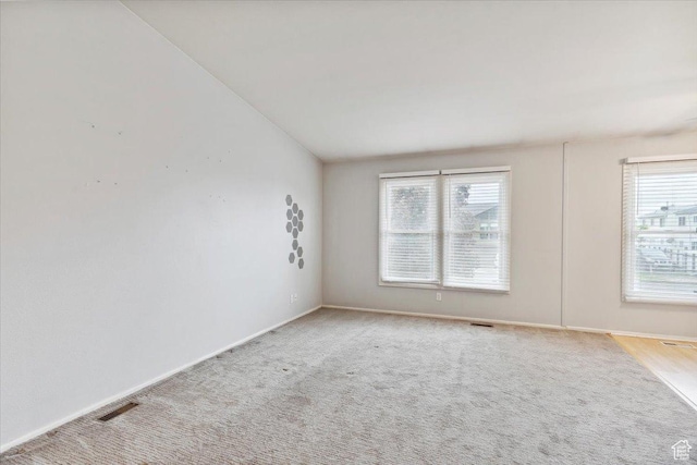 22 W 1470 S, Farmington, UT 84025 - unfurnished room featuring healthy amount of natural light, baseboards, and carpet floors